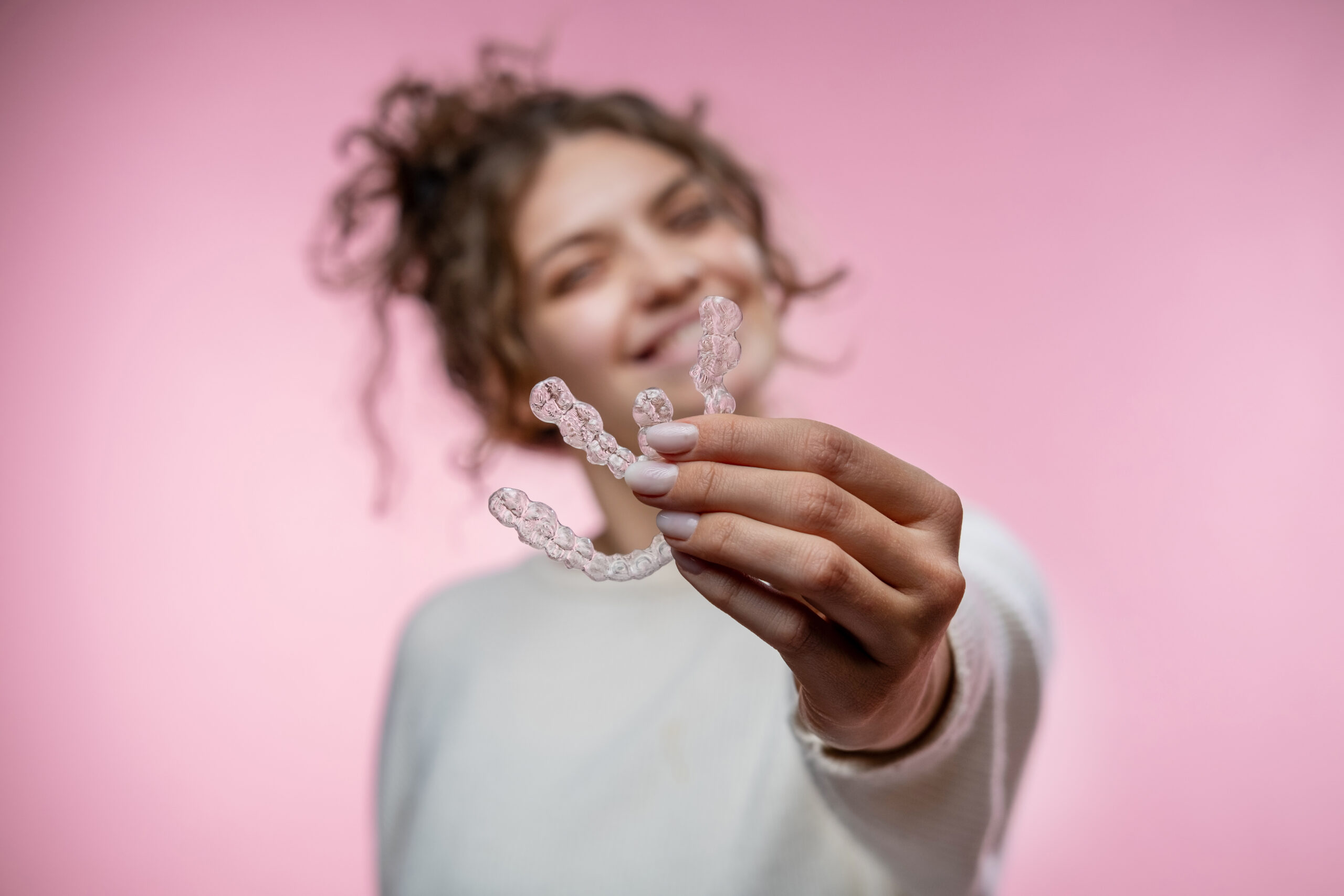 Invisible braces or aligners for a beautiful smile.